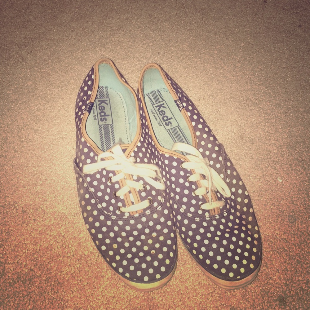 Navy blue and white keds
